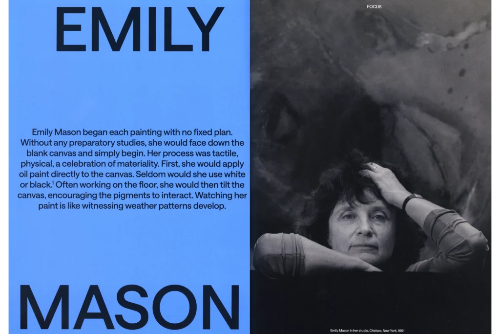 A spread of a magazine article; the page on the left is black text on a blue background, and the right page is a black-and-white portrait of an older, light-skinned woman with curly dark hair.