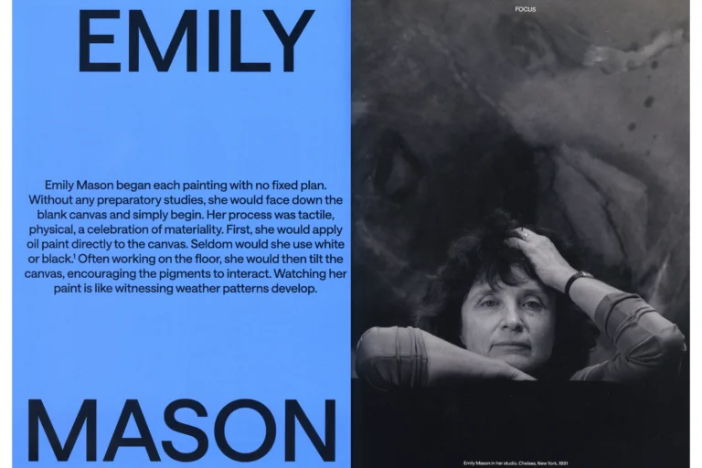 A spread of a magazine article; the page on the left is black text on a blue background, and the right page is a black-and-white portrait of an older, light-skinned woman with curly dark hair.